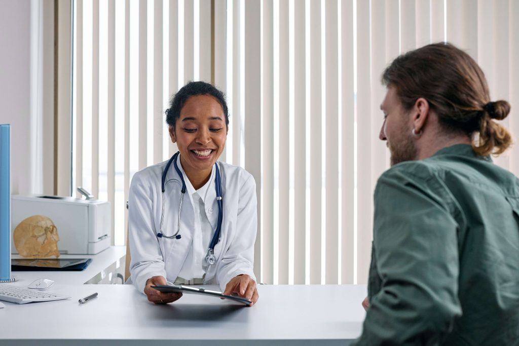 A patient consulting with their doctor.